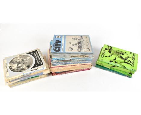 A quantity of assorted sporting books and programmes to include a selection of Manchester City examples vs Tottenham Hotspur 