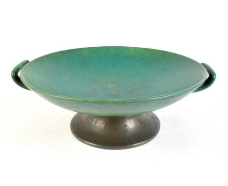 TUDRIC LANCASTRIAN; an art pottery twin handled bowl raised on pewter foot, with impressed no.01706, diameter 30cm.Additional