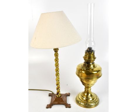 An Arts &amp; Crafts barleytwist table lamp, raised on copper plinth base, with Pugin-style motifs, height 36cm, diameter 13.
