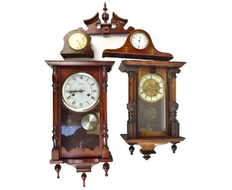 Two wall clocks including a Lincoln thirty one day mahogany cased reproduction example, the chapter ring set with Roman numer