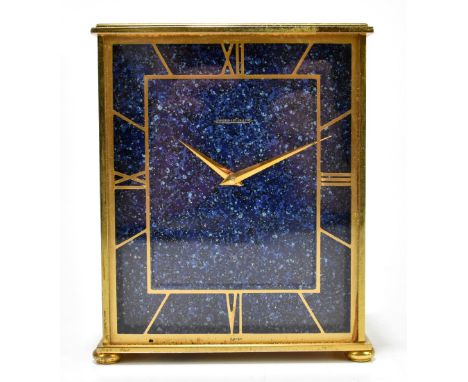 JAEGER-LE-COULTRE; an eight day brass cased mantel clock, the rectangular dial set with Roman numerals with a lapis face, hei