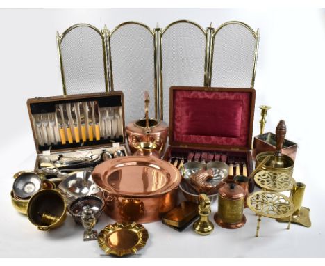 A group of metalware including two cased silver plated sets of flatware, copper and brass dishes, candlesticks, chamber stick