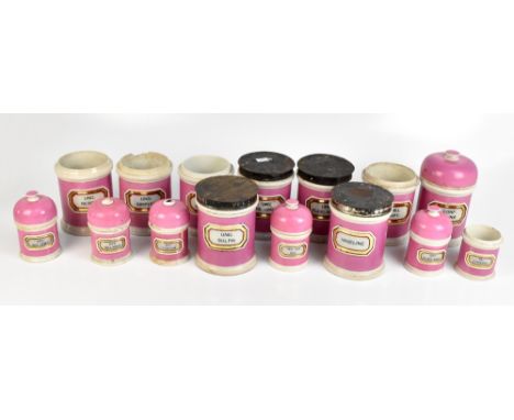 A collection of fifteen&nbsp;Victorian pink&nbsp;ceramic apothecary jars with glass labels,&nbsp;various sizes and labels,&nb