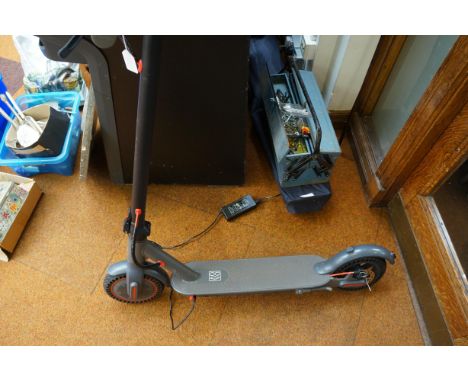 E Scooter electric scooter with charger - switches on, electrics work but cannot get it to run (We believe it is a fault with