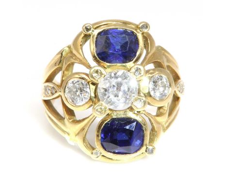 An 18ct gold diamond and sapphire ring, c.1960,by John Henry Lucas, commissioned utilising family gemstones. An old European 