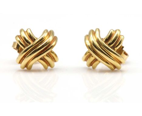 A pair of gold 'criss cross' earrings, by Tiffany &amp; Co.,with post and butterfly fittings. Signed Tiffany &amp; Co. marked