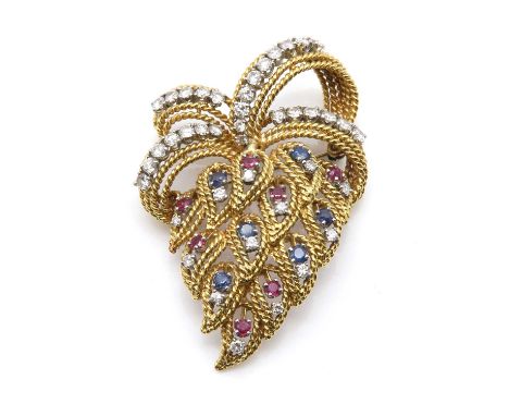 A continental ruby, sapphire and diamond spray brooch, c.1950,with a spray of twisted wire open leaves. The leaves each set w