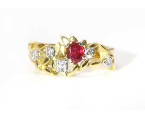 An 18ct gold ruby and diamond ring, by John Donald, c.1975,commissioned by the vendor's late father. An oval mixed cut ruby, 