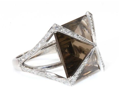 A white gold smoky quartz and diamond ring, attributed to Amanda Wakeley, c.2007,with a square pyramid laser cut smoky quartz