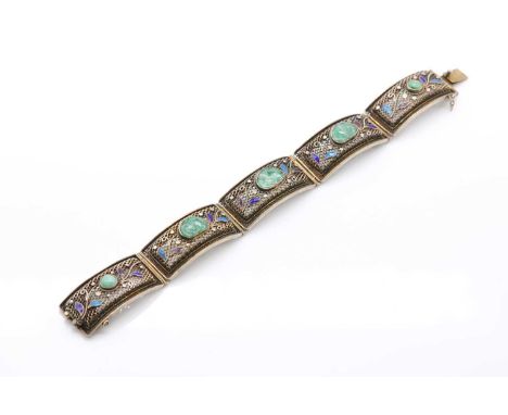 A Chinese silver gilt filigree, jade and enamel bracelet,carved and cabochon jade bezel set to the centre of rectangular curv