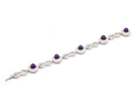 A French amethyst, diamond and enamel bracelet, c.1915,with a series of target style roundels, each one with a circular, suga