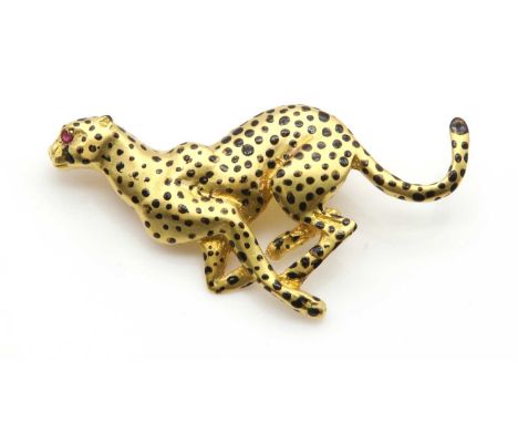 An 18ct gold running leopard brooch, by Harriet Glen, with satin finish, black enamel spots and ruby set eyes, to pin and rol