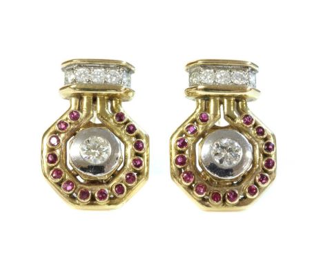 A pair of 9ct gold diamond and ruby earrings, a round brilliant cut diamond rub set in white gold doughnut collet, to yellow 