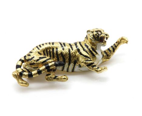 An 18ct gold diamond and enamel tiger brooch, by Cropp and Farr, c.1980,the naturalistically modelled tiger with black enamel