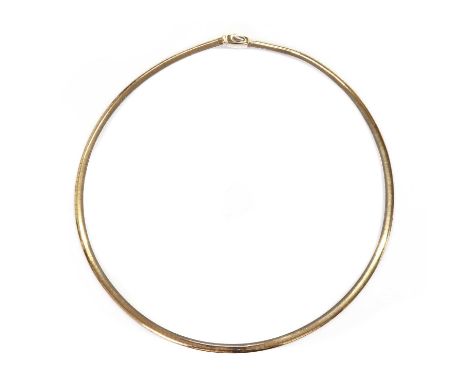 An Italian two colour omega link reversible necklace,with polished yellow links to one side and polished white to the reverse