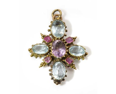 A Regency amethyst, aquamarine and ruby cross,with an oval mixed cut amethyst, spitch set to a bead edge collet. An oval mixe