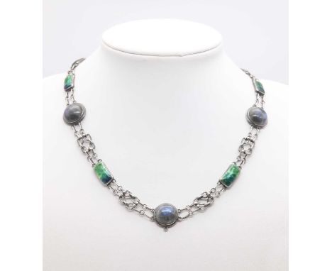 An Arts &amp; Crafts silver Newlyn enamel and labradorite necklace, c.1900,with a circular cabochon labradorite, rub set to t