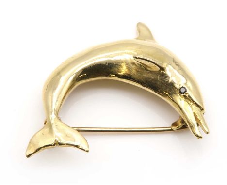 An 18ct gold dolphin brooch, by Harriet Glen,with a polished body and sapphire set eye, to pin and roller catch. London 2014.