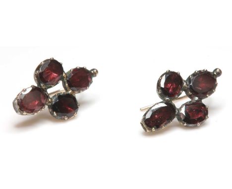 A pair of Georgian flat cut, foiled garnet, quatrefoil earrings,all in dome back settings, with a small bead top and later ho
