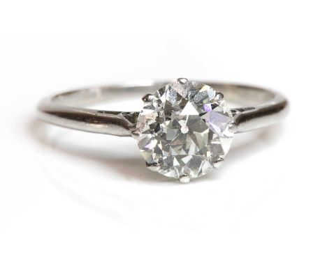 A single stone diamond ring,with an old European cut diamond, estimated as approximately 1.45ct, eight claw set to a scallope