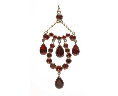A Georgian flat cut foiled garnet pendant,of swag and fringe form, with a graduated flat cut foiled garnet swag, all with fla
