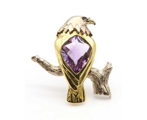 An 18ct gold amethyst set eagle brooch, by Harriet Glen,with a large kite shaped briolette amethyst spectacle set to the body