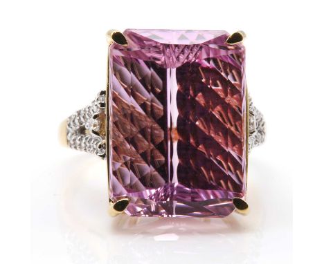 An 18ct gold single stone kunzite ring,with diamond set shoulders, with a rectangular cut cornered kunzite, with a step crown