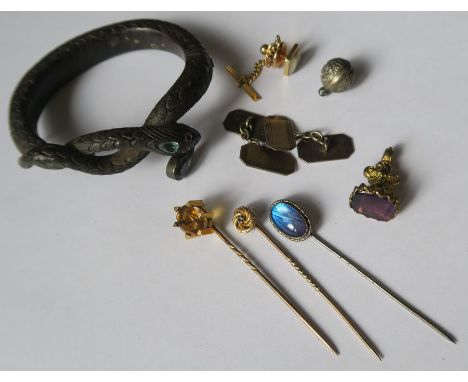 A hinged snake bangle, together with various dress studs, stick pins, etc.