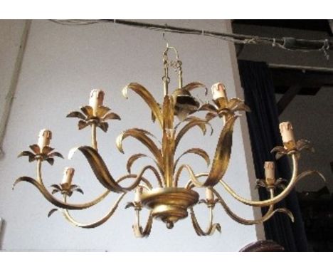 An eight branch gilt metal ceiling light, with foliate decoration, diameter approx 34ins