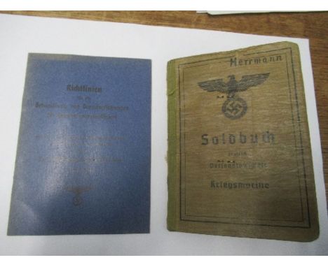 World War II, Kreigsmarine Soldbuch, belonging to Lance Corporal Machinist (Weapons Engineer) Arthur Herrmann, together with&
