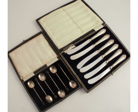 A cased set of six butter knives, with hallmarked silver loaded handles, together with six hallmarked silver bead terminal co