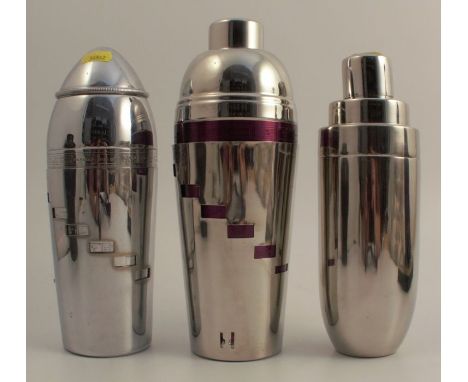 Three silver plated cocktail shakers, two with ingredients for different cocktails