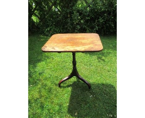 A 19th century mahogany rectangular topped occasional table, raised on a turned column, terminating in an umbrella tripod bas