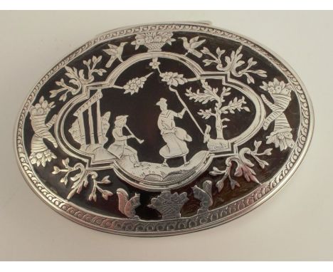 A silver and tortoiseshell oval snuff box, decorated with figures, birds and leaves, Birmingham 1921, diameter 2.75ins