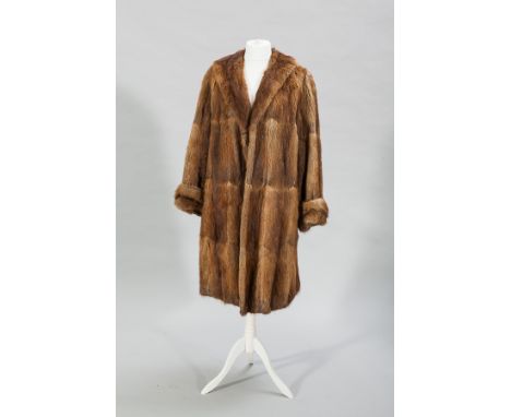 LADY'S VINTAGE MUSQUASH FUR COAT
single breasted and lined, approximate UK size 16-18, 101cm long when measured from the back