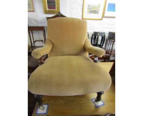 VICTORIAN UPHOLSTERED LOW BEDROOM ARMCHAIR, tapering legs with original ceramic castors 
