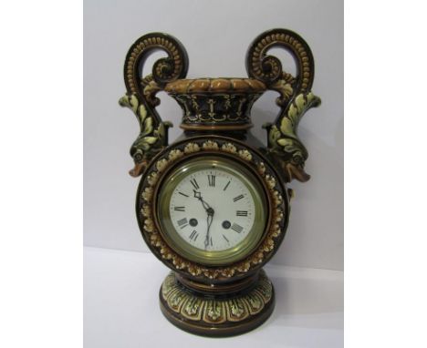 MAJOLICA MANTEL CLOCK, twin fish handled mantel clock, decorated in the Minton style, French bell strike movement (circular b