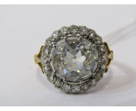 IMPRESSIVE 18ct YELLOW GOLD DIAMOND RING, principal old cushion cut diamond surrounded by further old cut diamonds in halo se