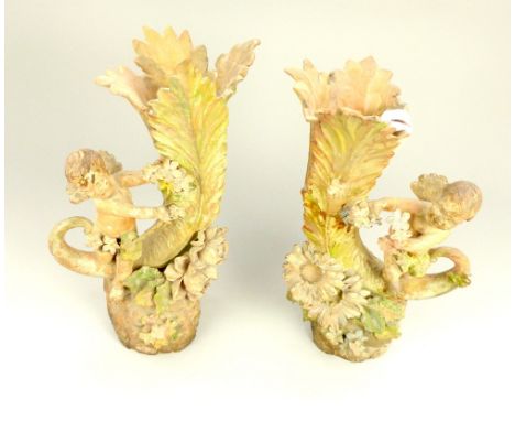 Pair of continental 19th century terracotta cornucopia vases, hand painted decoration, winged putti with floral branches step