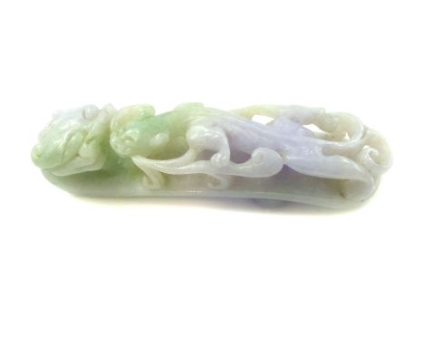 An Antique Chinese Chilong Belt Hook Qing dynasty, in green and lavendar jade, finely carved to depict a chilong with undulat