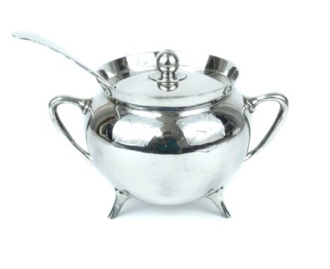 Silver plated cauldron type soup tureen in the manner of Christopher Dresser, lidded with twin handles and raised on three pe