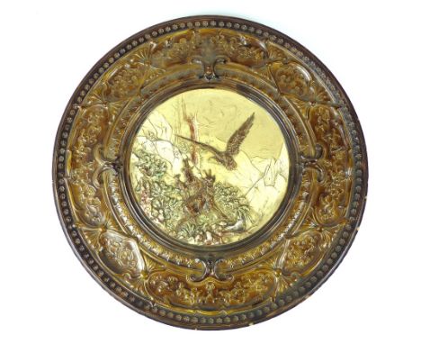 Aesthetic Movement continental ceramic charger, two tone outer border, inner four tone scene of a goat protecting young from 