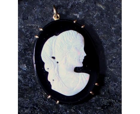 An antique opal and onyx carved cameo pendant depicting a woman in grecian dress. Drop 5cm. Gross Weight 10g.