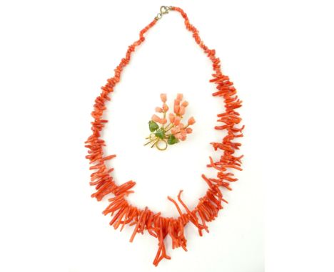 A carved coral and jade floral spray brooch in high carat yellow gold modeled as a bunch of flowers, together with a naturali