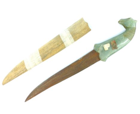 Late 19th / early 20th century Mongolian jade dagger, the handle carved as a horses head, with a finely engraved steel blade,