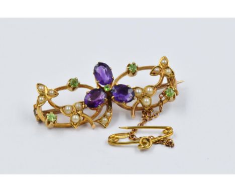 Gold bar brooch set amethyst peridot and split pearlsIn excellent condition, with no damage or repair. No hallmarks 33mm x 15