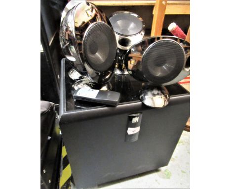 Kef speaker system, to include a large subwoofer and five other surround sound speakers with remote control 