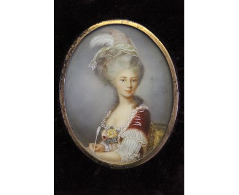 Watercolour portrait miniature of a lady wearing an ornate headdress, 3ins x 2.25ins approximately, in an ebonised frame toge