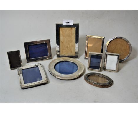 Collection of ten small silver rectangular, circular and oval photograph frames (some at fault)Most with dents and surface sc