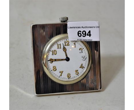Birmingham silver mounted square travel clock with engine turned decoration, the enamel dial with Arabic numerals (at fault) 